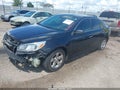 2015 Chevrolet Malibu — photo 2 of 13 | VIN 1G11B5SLXFF194361