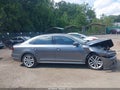 2017 Volkswagen Passat — photo 13 of 16 | VIN 1VWCM7A35HC036261