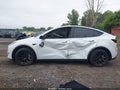 2023 Tesla Model Y — photo 14 of 16 | VIN 7SAYGDEE3PF615585