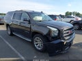 2015 GMC Yukon XL — photo 6 of 16 | VIN 1GKS2HKC1FR572504