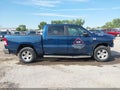 2021 Ram 1500 — photo 13 of 16 | VIN 1C6SRFFT3MN517229