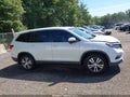 2016 Honda Pilot — photo 13 of 16 | VIN 5FNYF6H7XGB036196