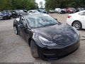 2022 Tesla Model 3 — photo 1 of 15 | VIN 5YJ3E1EB7NF176177