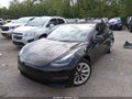 2022 Tesla Model 3 — photo 2 of 15 | VIN 5YJ3E1EB7NF176177