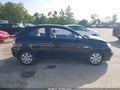 2008 Hyundai Accent — photo 13 of 16 | VIN KMHCM36C08U072675