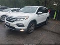 2016 Honda Pilot — photo 2 of 20 | VIN 5FNYF6H08GB020307