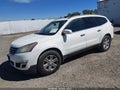 2014 Chevrolet Traverse — photo 2 of 16 | VIN 1GNKVHKD9EJ164168