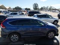 2013 Honda CR-V — photo 13 of 19 | VIN 2HKRM4H52DH674601