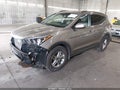 2018 Hyundai Santa Fe — photo 2 of 17 | VIN 5NMZUDLB0JH090140