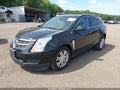 2012 Cadillac SRX — photo 2 of 16 | VIN 3GYFNDE32CS622435