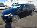 2014 Honda Odyssey — photo 2 of 17 | VIN 5FNRL5H9XEB114904