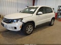 2013 Volkswagen Tiguan — photo 2 of 17 | VIN WVGBV3AX0DW090871