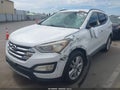 2014 Hyundai Santa Fe — photo 6 of 13 | VIN 5XYZU3LA3EG150851