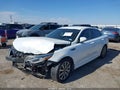 2019 Kia Optima — photo 2 of 16 | VIN 5XXGT4L35KG379100