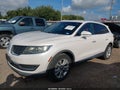 2018 Lincoln MKX — photo 2 of 18 | VIN 2LMPJ6JR1JBL35344