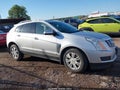 2014 Cadillac SRX — photo 13 of 16 | VIN 3GYFNBE39ES563200