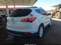 2013 Hyundai Santa Fe — photo 4 of 11 | VIN 5XYZU3LA3DG082601
