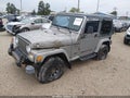 2002 Jeep Wrangler — photo 2 of 14 | VIN 1J4FA49S92P712949
