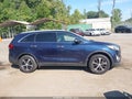 2016 Kia Sorento — photo 14 of 17 | VIN 5XYPHDA12GG031065