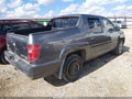 2011 Honda Ridgeline — photo 4 of 16 | VIN 5FPYK1F58BB453025