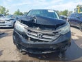 2013 Honda CR-V — photo 13 of 17 | VIN 2HKRM4H76DH685909