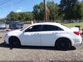 2014 Chrysler 200 — photo 14 of 16 | VIN 1C3CCBCG9EN186421