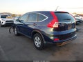 2015 Honda CR-V — photo 3 of 16 | VIN 3CZRM3H34FG704017