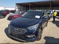 2018 Hyundai Santa Fe — photo 2 of 16 | VIN 5XYZW4LA2JG535618
