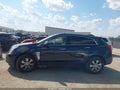 2014 Cadillac SRX — photo 14 of 16 | VIN 3GYFNBE37ES625824