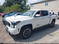 2024 Toyota Tacoma — photo 2 of 16 | VIN 3TMLB5JN5RM057562