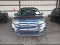 2018 Honda Pilot — photo 11 of 15 | VIN 5FNYF5H56JB018813