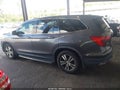 2018 Honda Pilot — photo 13 of 15 | VIN 5FNYF5H56JB018813