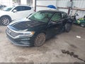 2022 Volkswagen Passat — photo 2 of 16 | VIN 1VWBA7A30NC003295
