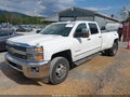 2015 Chevrolet Silverado — photo 2 of 16 | VIN 1GC4K0C88FF545012