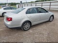 2010 Volkswagen Jetta — photo 4 of 16 | VIN 3VWRX7AJ5AM047491