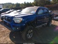 2014 Toyota Tacoma — photo 2 of 16 | VIN 3TMLU4EN5EM141616