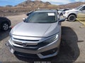 2016 Honda Civic — photo 12 of 16 | VIN 19XFC1F94GE007838