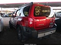 2012 Nissan Xterra — photo 3 of 15 | VIN 5N1AN0NWXCC520207