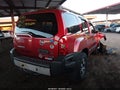 2012 Nissan Xterra — photo 4 of 15 | VIN 5N1AN0NWXCC520207