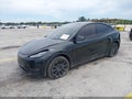 2025 Tesla Model Y — photo 2 of 20 | VIN 7SAYGDEE7SF302130