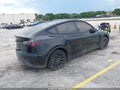 2025 Tesla Model Y — photo 4 of 20 | VIN 7SAYGDEE7SF302130