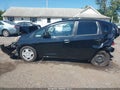2013 Honda Fit — photo 14 of 16 | VIN JHMGE8H31DC067240