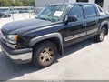 2004 Chevrolet Avalanche — photo 2 of 12 | VIN 3GNEK12T74G264127