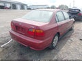 1999 Honda Civic — photo 4 of 16 | VIN 1HGEJ6675XL031975