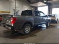 2023 Nissan Titan — photo 4 of 16 | VIN 1N6AA1ECXPN113636