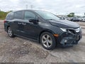 2018 Honda Odyssey — photo 1 of 16 | VIN 5FNRL6H76JB001868