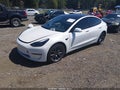 2021 Tesla Model 3 — photo 2 of 14 | VIN 5YJ3E1EA2MF047253