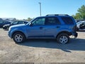 2009 Ford Escape — photo 14 of 16 | VIN 1FMCU03719KB64879
