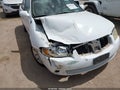 2004 Nissan Sentra — photo 6 of 17 | VIN 3N1CB51DX4L482526