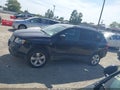 2011 Jeep Compass — photo 14 of 16 | VIN 1J4NF1FBXBD189023